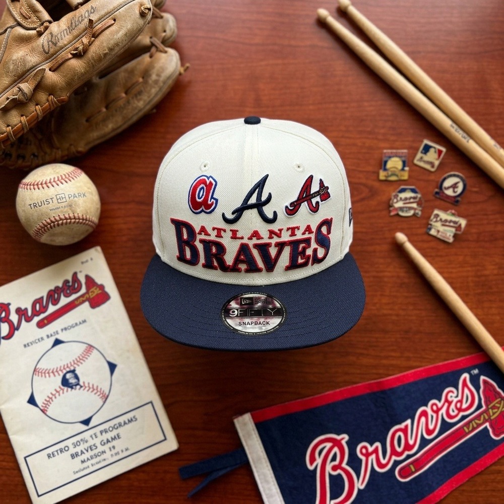 New Era Atlanta Braves Logo History 9FIFTY Snapback Hat Cream Navy New